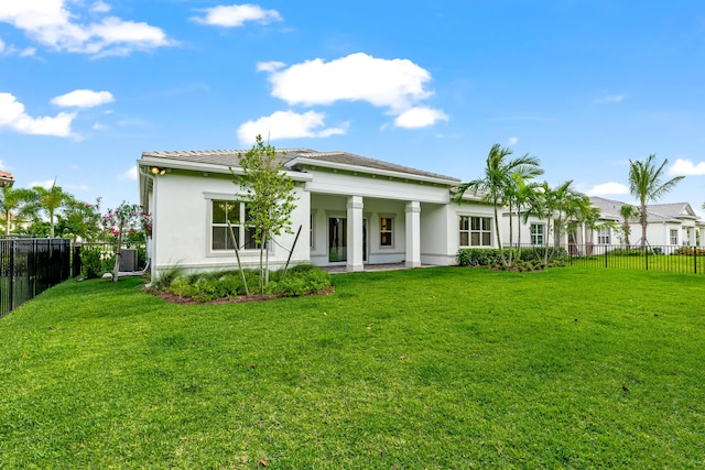 10803 Stellar Cir, Palm Beach Gardens, FL 33412 - rear view of property featuring stucco siding