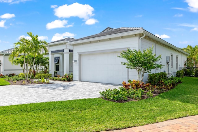 10803 Stellar Cir, Palm Beach Gardens, FL 33412 - single story home featuring decorative driveway and an attached garage