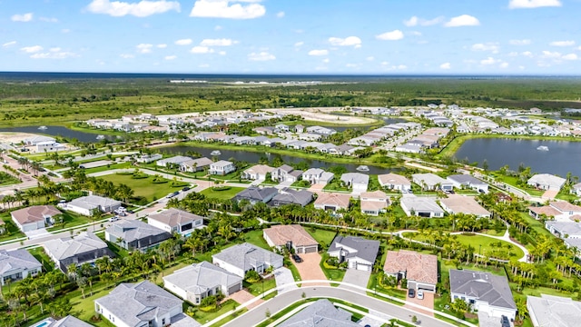 10803 Stellar Cir, Palm Beach Gardens, FL 33412 - aerial overview of property's location with nearby suburban area and a nearby body of water