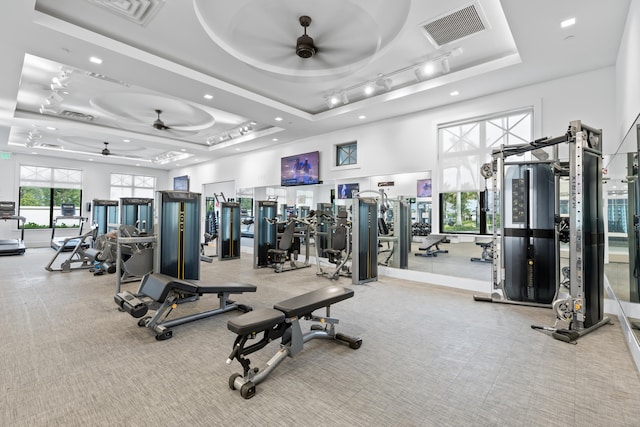10803 Stellar Cir, Palm Beach Gardens, FL 33412 - workout area with a raised ceiling, a ceiling fan, carpet floors, recessed lighting, and a towering ceiling