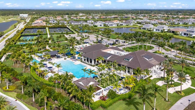 10803 Stellar Cir, Palm Beach Gardens, FL 33412 - aerial view of residential area with a nearby body of water and a pool area