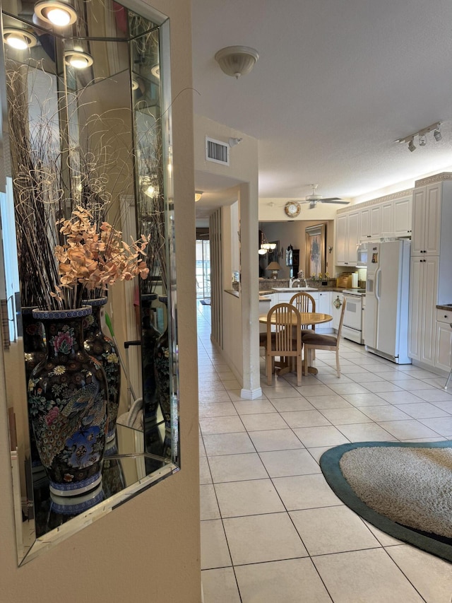 7715 Southampton Ter Unit 102, Tamarac, FL 33321 - hall with light tile patterned floors