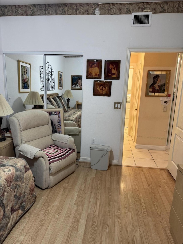 7715 Southampton Ter Unit 102, Tamarac, FL 33321 - living area with light wood finished floors and baseboards