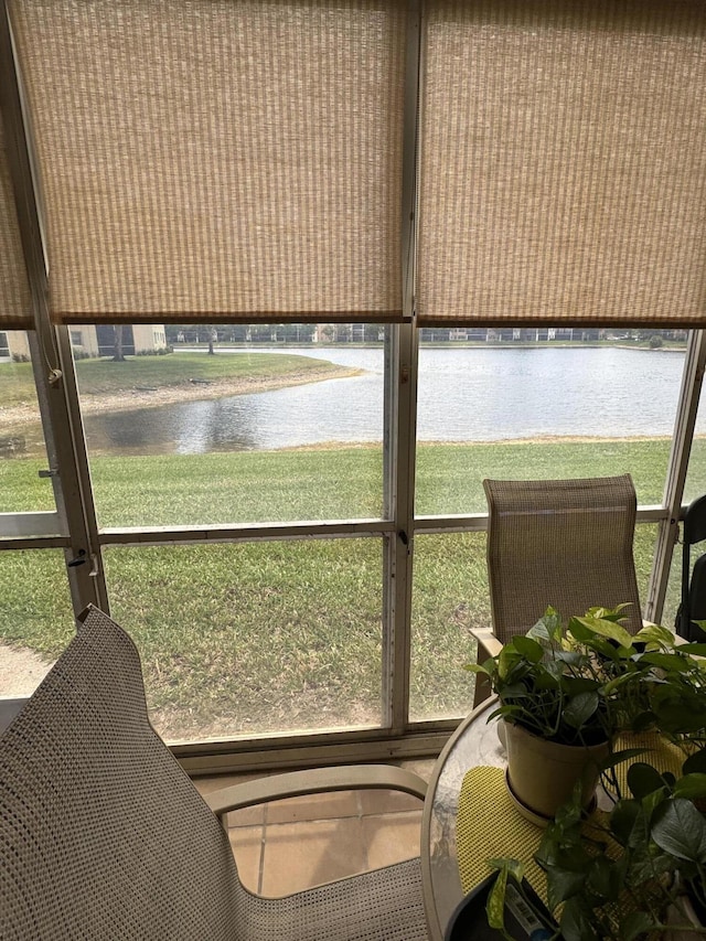 7715 Southampton Ter Unit 102, Tamarac, FL 33321 - sunroom featuring a water view