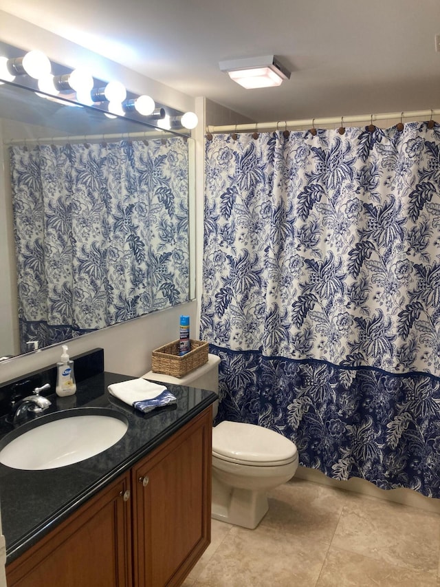 1401 Tidal Pointe Blvd Unit 102, Jupiter, FL 33477 - full bathroom with vanity, toilet, tile patterned floors, and a shower with shower curtain