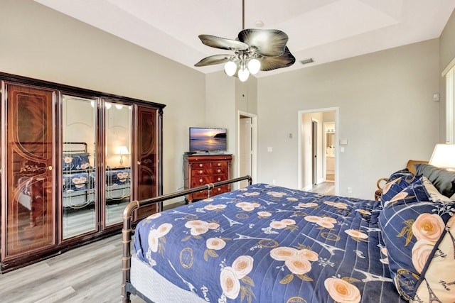 4610 Bucida Rd, Boynton Beach, FL 33436 - bedroom with light wood-type flooring and ceiling fan