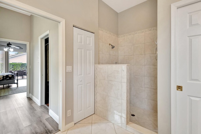 4610 Bucida Rd, Boynton Beach, FL 33436 - bathroom with walk in shower, a ceiling fan, baseboards, and wood finished floors