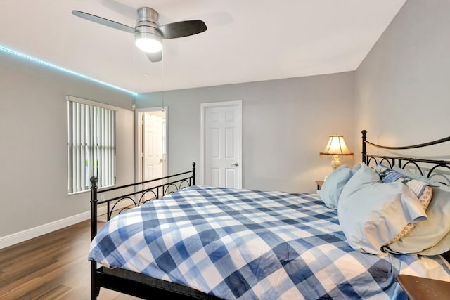 4610 Bucida Rd, Boynton Beach, FL 33436 - bedroom with wood finished floors, baseboards, and a ceiling fan