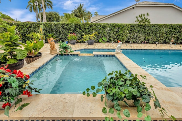 4610 Bucida Rd, Boynton Beach, FL 33436 - view of swimming pool with a pool with connected hot tub and a fenced backyard
