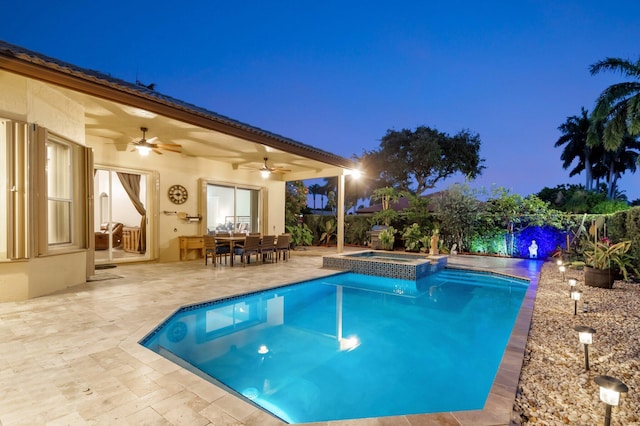 4610 Bucida Rd, Boynton Beach, FL 33436 - pool at twilight featuring a ceiling fan, an in-ground hot tub, a patio area, and outdoor dining area
