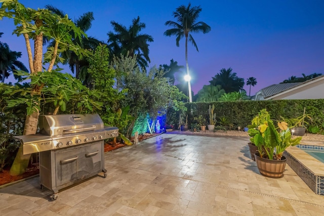 4610 Bucida Rd, Boynton Beach, FL 33436 - fenced backyard featuring a patio and grilling area