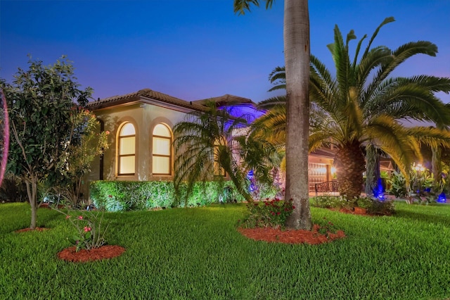 4610 Bucida Rd, Boynton Beach, FL 33436 - view of front of house featuring a front lawn and stucco siding