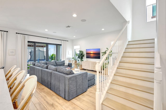 13291 Machiavelli Way, Palm Beach Gardens, FL 33418 - living area featuring stairs, light wood finished floors, and recessed lighting