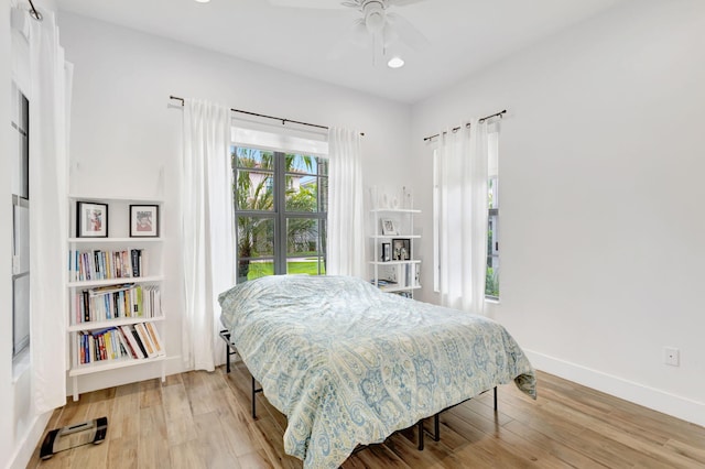 13291 Machiavelli Way, Palm Beach Gardens, FL 33418 - bedroom with light wood-type flooring, baseboards, recessed lighting, and a ceiling fan