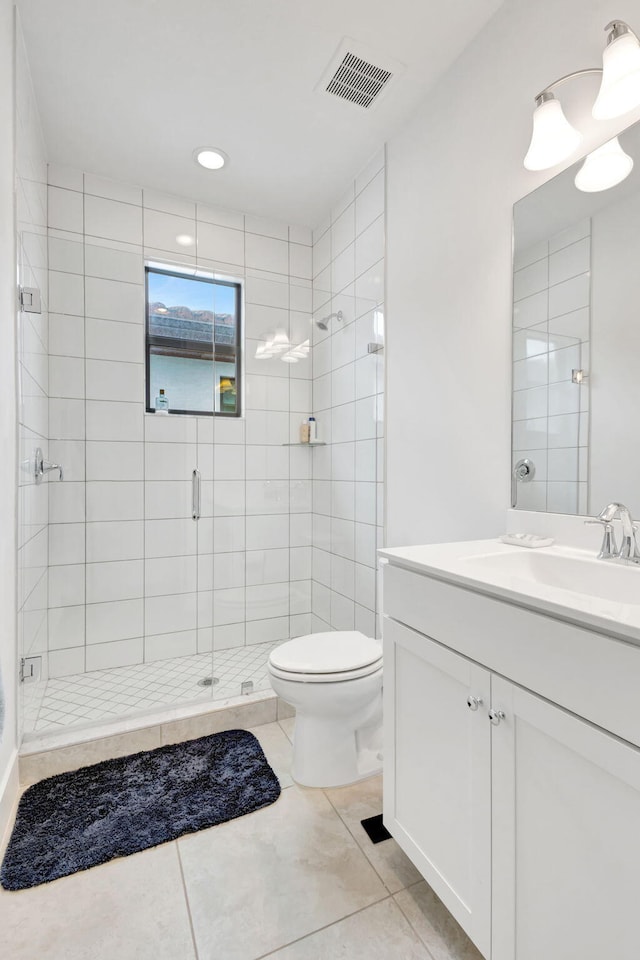 13291 Machiavelli Way, Palm Beach Gardens, FL 33418 - full bath with vanity, a stall shower, toilet, and tile patterned flooring