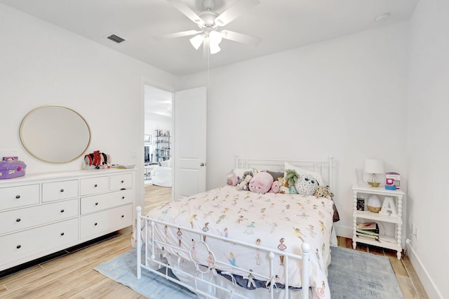 13291 Machiavelli Way, Palm Beach Gardens, FL 33418 - bedroom with light wood-type flooring and ceiling fan