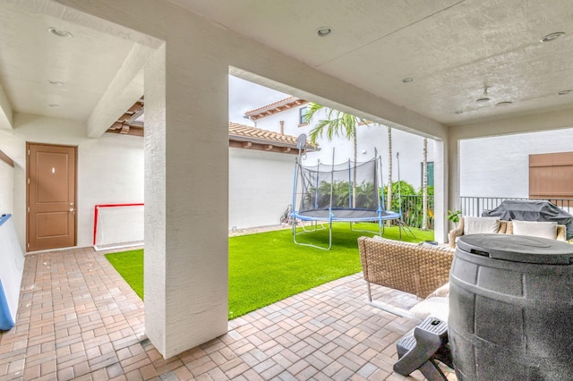 13291 Machiavelli Way, Palm Beach Gardens, FL 33418 - view of patio featuring a trampoline