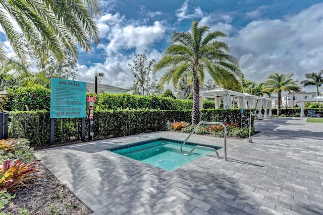 13291 Machiavelli Way, Palm Beach Gardens, FL 33418 - view of swimming pool with a community hot tub