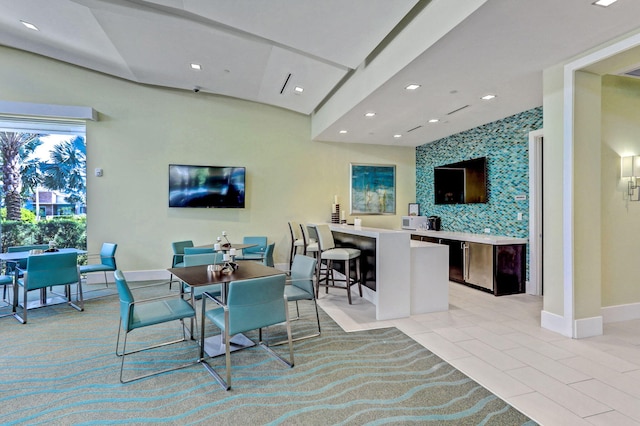 13291 Machiavelli Way, Palm Beach Gardens, FL 33418 - dining room featuring baseboards, recessed lighting, light tile patterned flooring, and an accent wall
