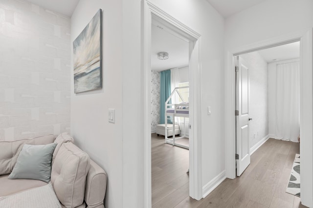 587 Sanderling Cir, Deerfield Beach, FL 33442 - hallway with wood finished floors and baseboards