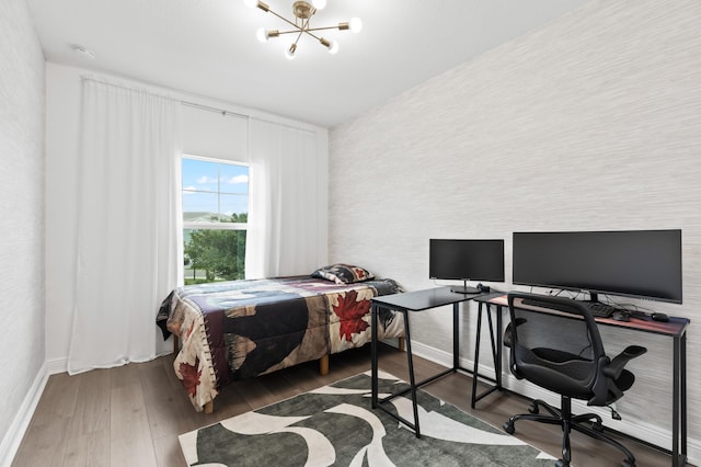 587 Sanderling Cir, Deerfield Beach, FL 33442 - bedroom with a desk, wood finished floors, a chandelier, and baseboards