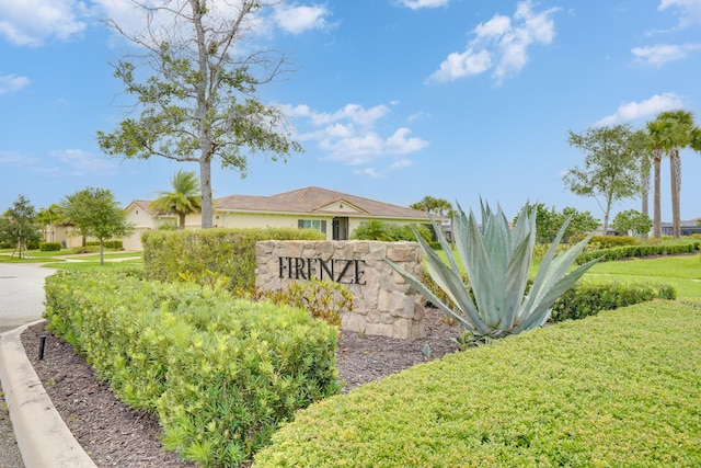 24038 SW Firenze Way, Port Saint Lucie, FL 34986 - community / neighborhood sign featuring a lawn