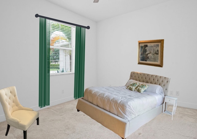 24038 SW Firenze Way, Port Saint Lucie, FL 34986 - carpeted bedroom featuring multiple windows, baseboards, and ceiling fan