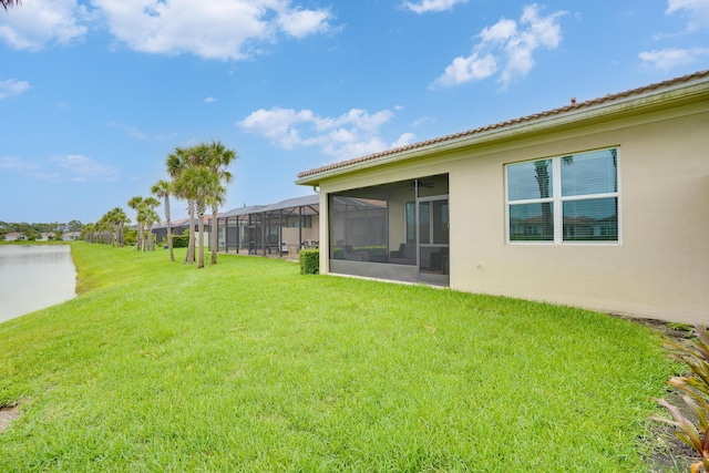 24038 SW Firenze Way, Port Saint Lucie, FL 34986 - view of grassy yard featuring a sunroom