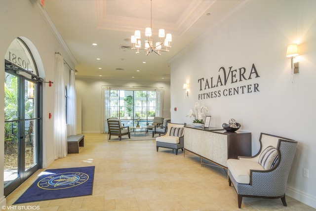 24038 SW Firenze Way, Port Saint Lucie, FL 34986 - welcome area with a chandelier, ornamental molding, and recessed lighting