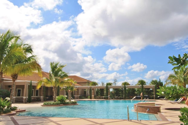 24038 SW Firenze Way, Port Saint Lucie, FL 34986 - community pool with a patio area