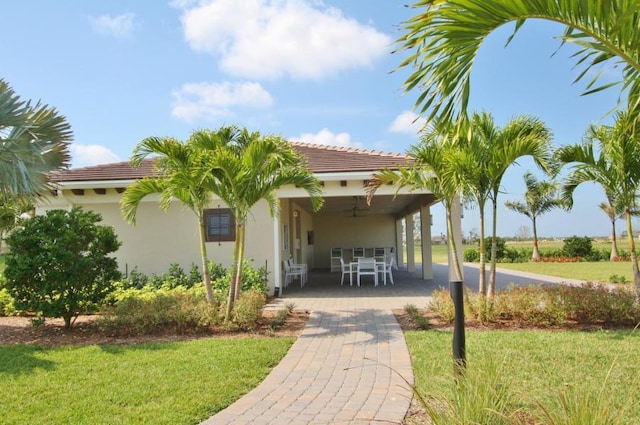 24038 SW Firenze Way, Port Saint Lucie, FL 34986 - view of community featuring a lawn