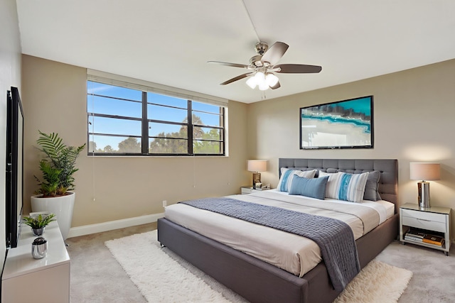 2430 Deer Creek Country Club Blvd Unit 205-2, Deerfield Beach, FL 33442 - bedroom featuring light carpet and ceiling fan