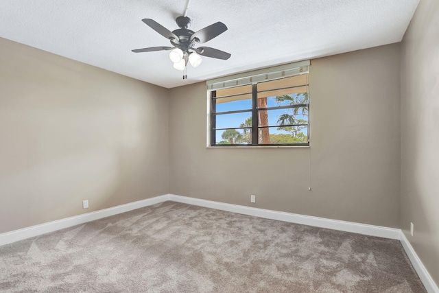2430 Deer Creek Country Club Blvd Unit 205-2, Deerfield Beach, FL 33442 - carpeted empty room with a ceiling fan and a textured ceiling