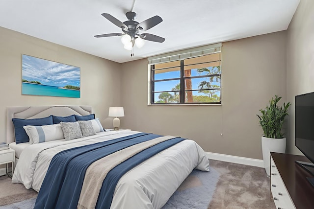 2430 Deer Creek Country Club Blvd Unit 205-2, Deerfield Beach, FL 33442 - carpeted bedroom featuring baseboards and a ceiling fan