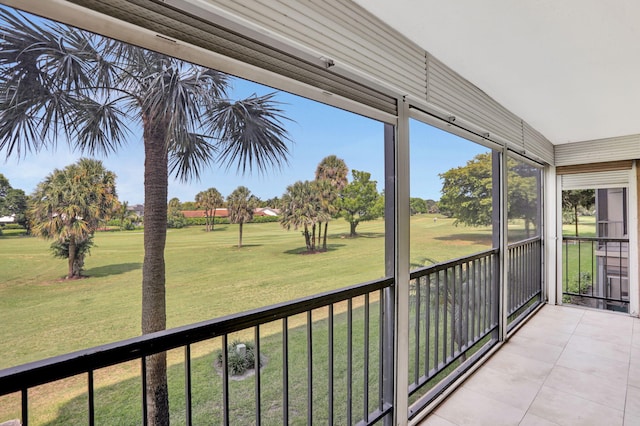 2430 Deer Creek Country Club Blvd Unit 205-2, Deerfield Beach, FL 33442 - unfurnished sunroom featuring golf course view