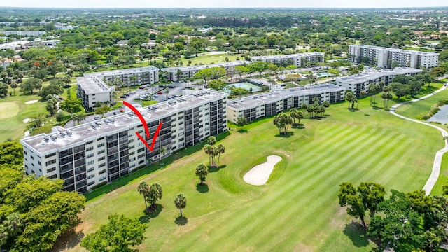 2430 Deer Creek Country Club Blvd Unit 205-2, Deerfield Beach, FL 33442 - drone / aerial view of apartment complex and a local golf course