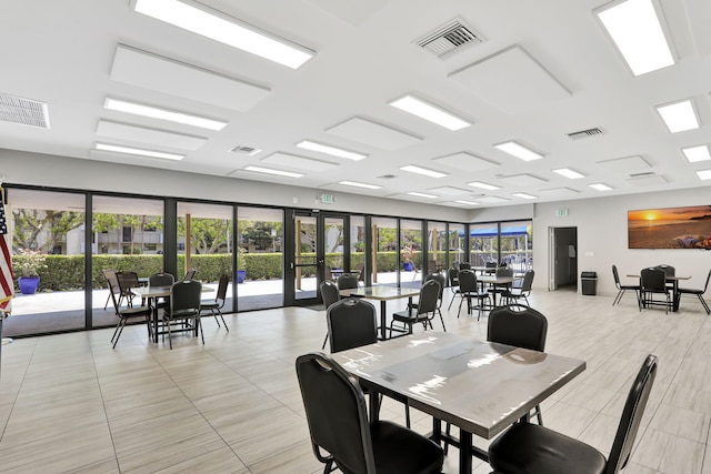 2430 Deer Creek Country Club Blvd Unit 205-2, Deerfield Beach, FL 33442 - dining area with light tile patterned floors