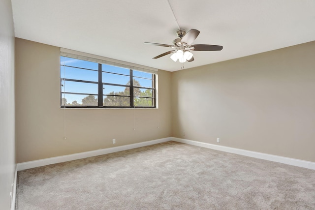 2430 Deer Creek Country Club Blvd Unit 205-2, Deerfield Beach, FL 33442 - unfurnished room featuring carpet flooring and a ceiling fan