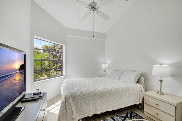 5419 Firenze Dr Unit K, Boynton Beach, FL 33437 - bedroom with wood finished floors, baseboards, lofted ceiling, and ceiling fan