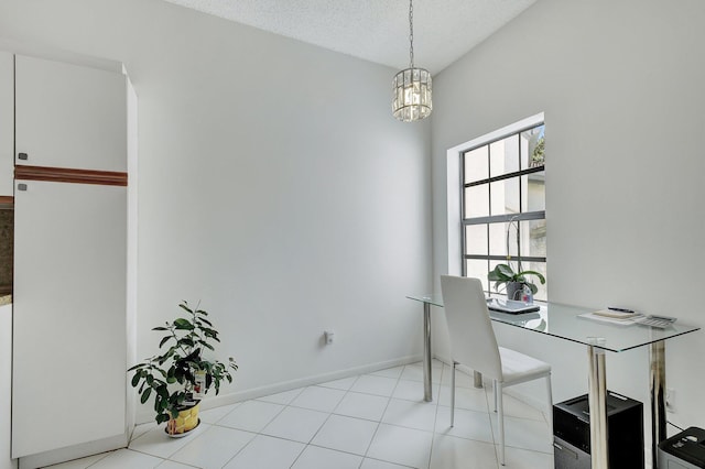 5419 Firenze Dr Unit K, Boynton Beach, FL 33437 - dining room with a chandelier, baseboards, and a textured ceiling