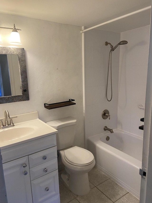 294 Brittany Unit G, Delray Beach, FL 33446 - bathroom featuring tile patterned flooring, vanity,  shower combination, and toilet