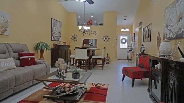 804 Sky Pine Way Unit C, Greenacres, FL 33415 - living room featuring ceiling fan, a chandelier, tile patterned floors, and a high ceiling