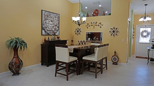 804 Sky Pine Way Unit C, Greenacres, FL 33415 - tiled dining room featuring a chandelier, baseboards, and a towering ceiling