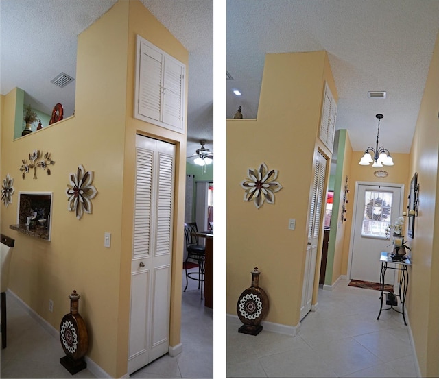 804 Sky Pine Way Unit C, Greenacres, FL 33415 - corridor with a textured ceiling, light tile patterned floors, a chandelier, and baseboards
