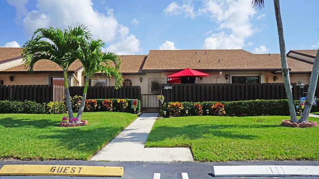804 Sky Pine Way Unit C, Greenacres, FL 33415 - ranch-style home with stucco siding and a gate
