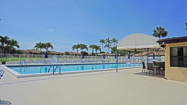 804 Sky Pine Way Unit C, Greenacres, FL 33415 - community pool with a patio area