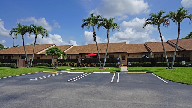804 Sky Pine Way Unit C, Greenacres, FL 33415 - view of property featuring uncovered parking