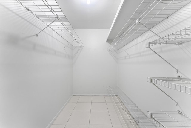 117 Lake Dora Dr, West Palm Beach, FL 33411 - walk in closet featuring tile patterned floors