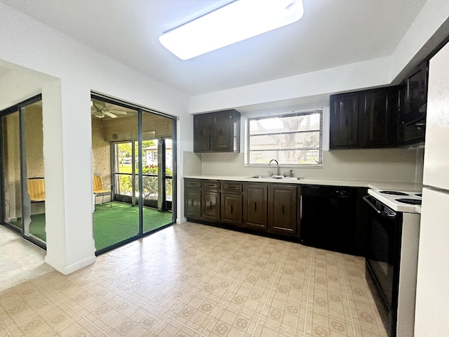 4940 Hawkwood Way Unit A, Boynton Beach, FL 33436 - kitchen with electric stove, a sink, light countertops, and healthy amount of natural light