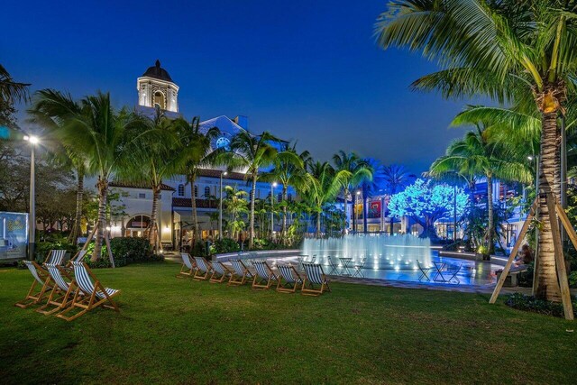 651 Okeechobee Blvd Unit 408, West Palm Beach, FL 33401 - yard at twilight with a lawn